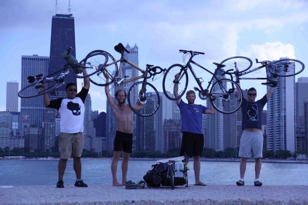 Rob Greenfield and 3 fellow cyclists celebrate their arrival in Chicago.